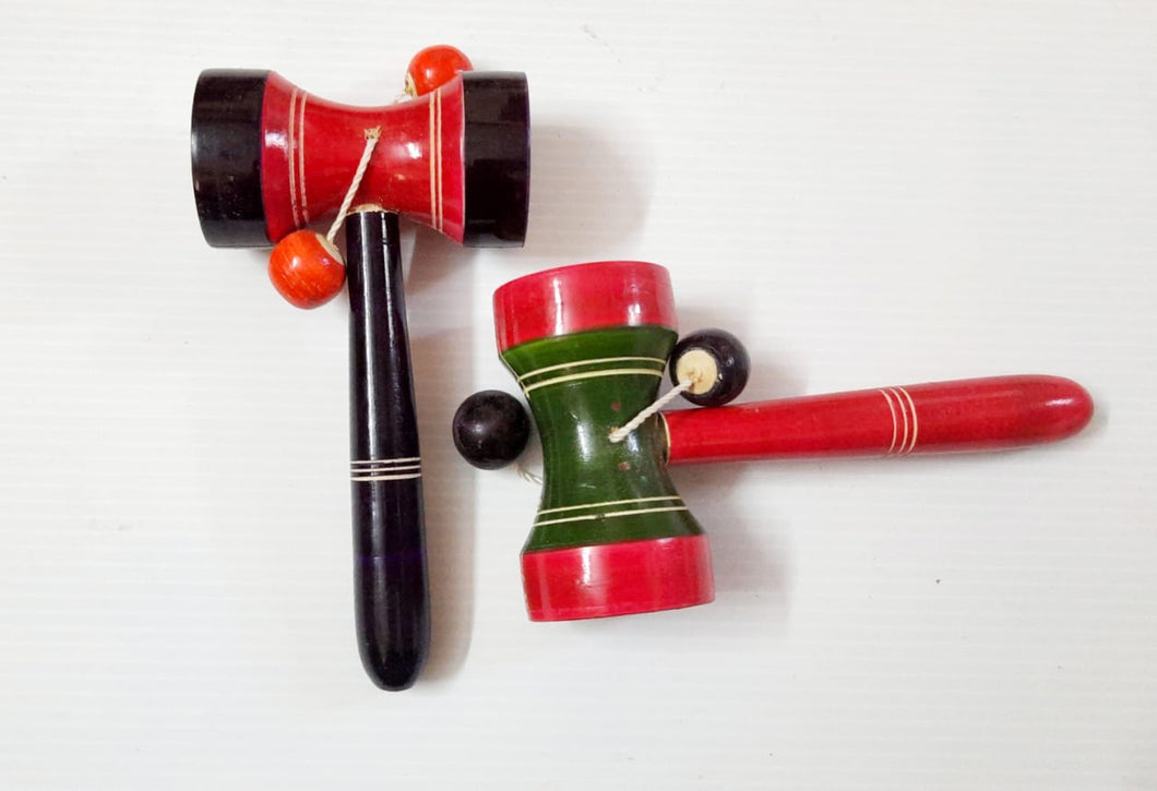 Wooden Rattle with two balls.