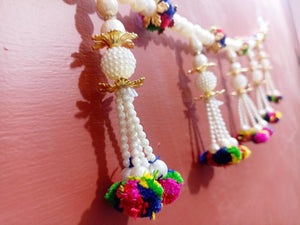 Door Hanging  with Pearl strings and pom Hanged.